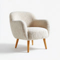 Fauteuil en cuir d'agneau ivoire avec accoudoirs et pieds en bois